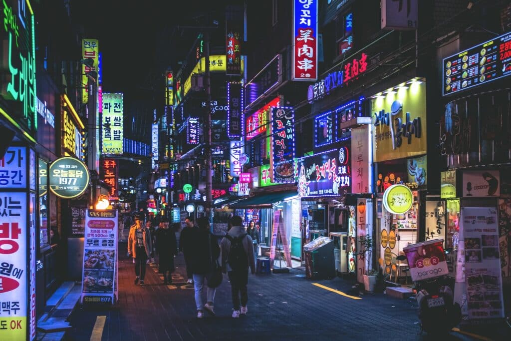 south-korean-street-at-night-lit-up-by-neon-lights