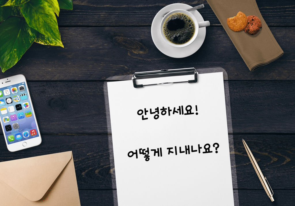 overhead-shot-of-notepad-with-korean-text-that-says-hello-how-are-you-doing