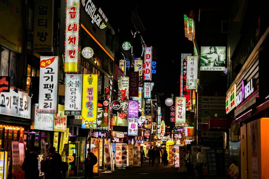 photo-of-south-korean-street-at-night-with-colorful-neon-signs-in-korean