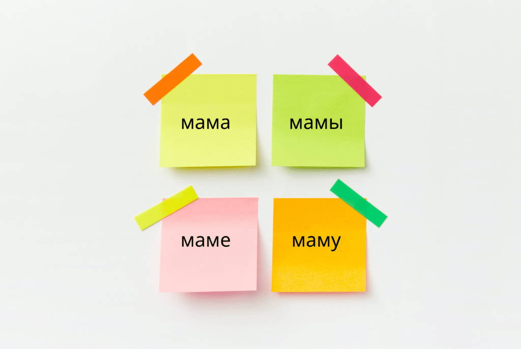 four-multicolored-sticky-notes-with-the-first-declensions-of-the-russian-word-for-mom