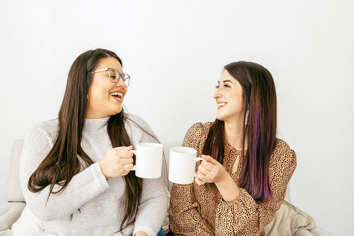 two women having coffee together