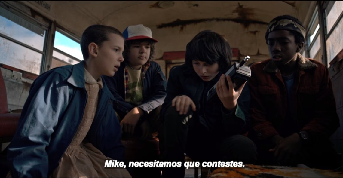 Spanish subtitle in a movie. The subtitle reads 'Mike, necesitamos que contestes.' which translates into Mike, we need you to answer