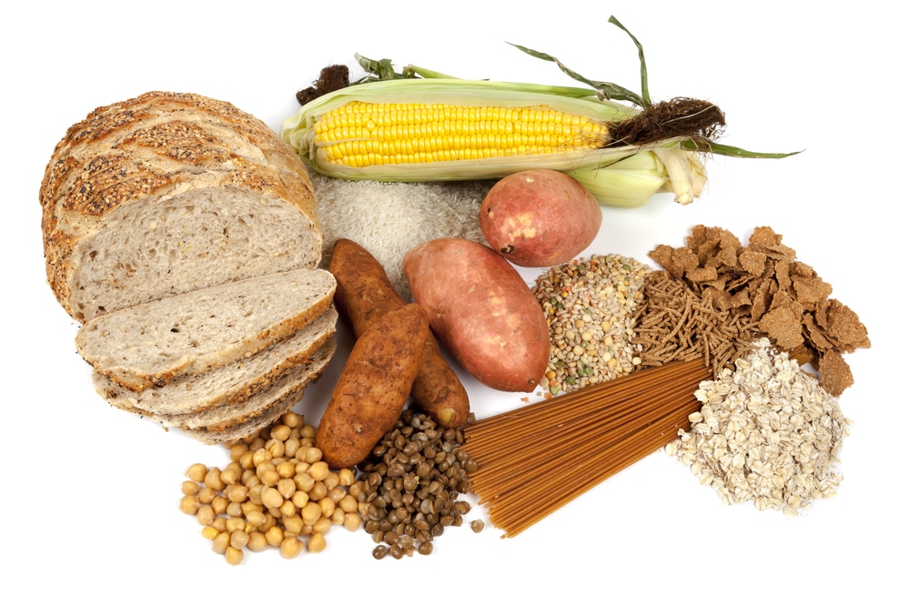 Collection of foods including bread and corn