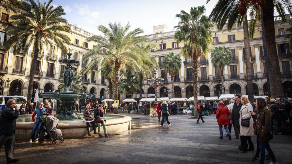 people in a plaza in barcelona