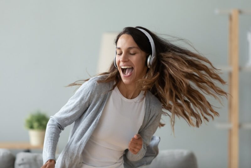 woman-listening-and-dancing-to-music