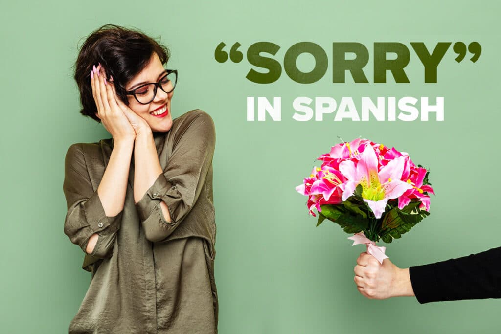 smiling woman receiving flowers behind the words "sorry in spanish"