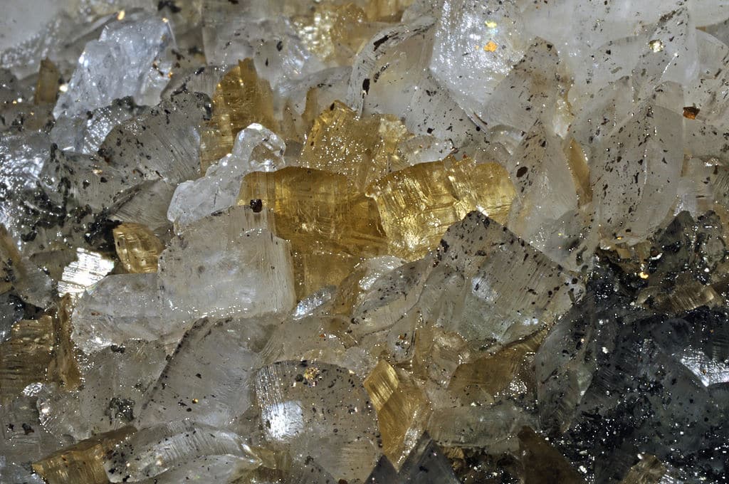 Crystals of white and brown siderites, pyrite and pyrrhotite found in Mexico