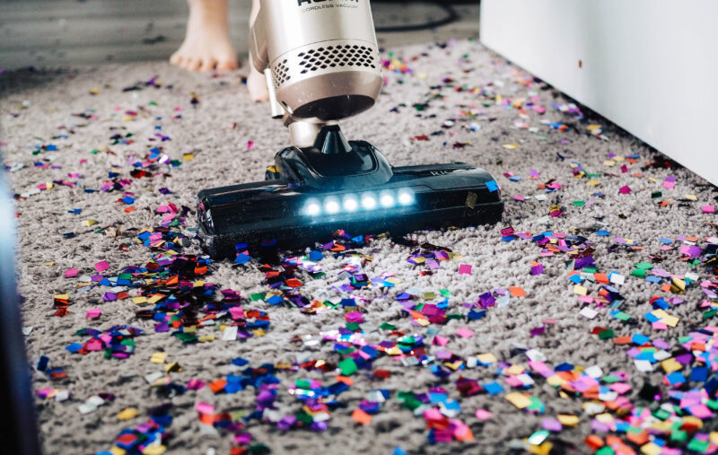 Vacuuming up glitter after a party