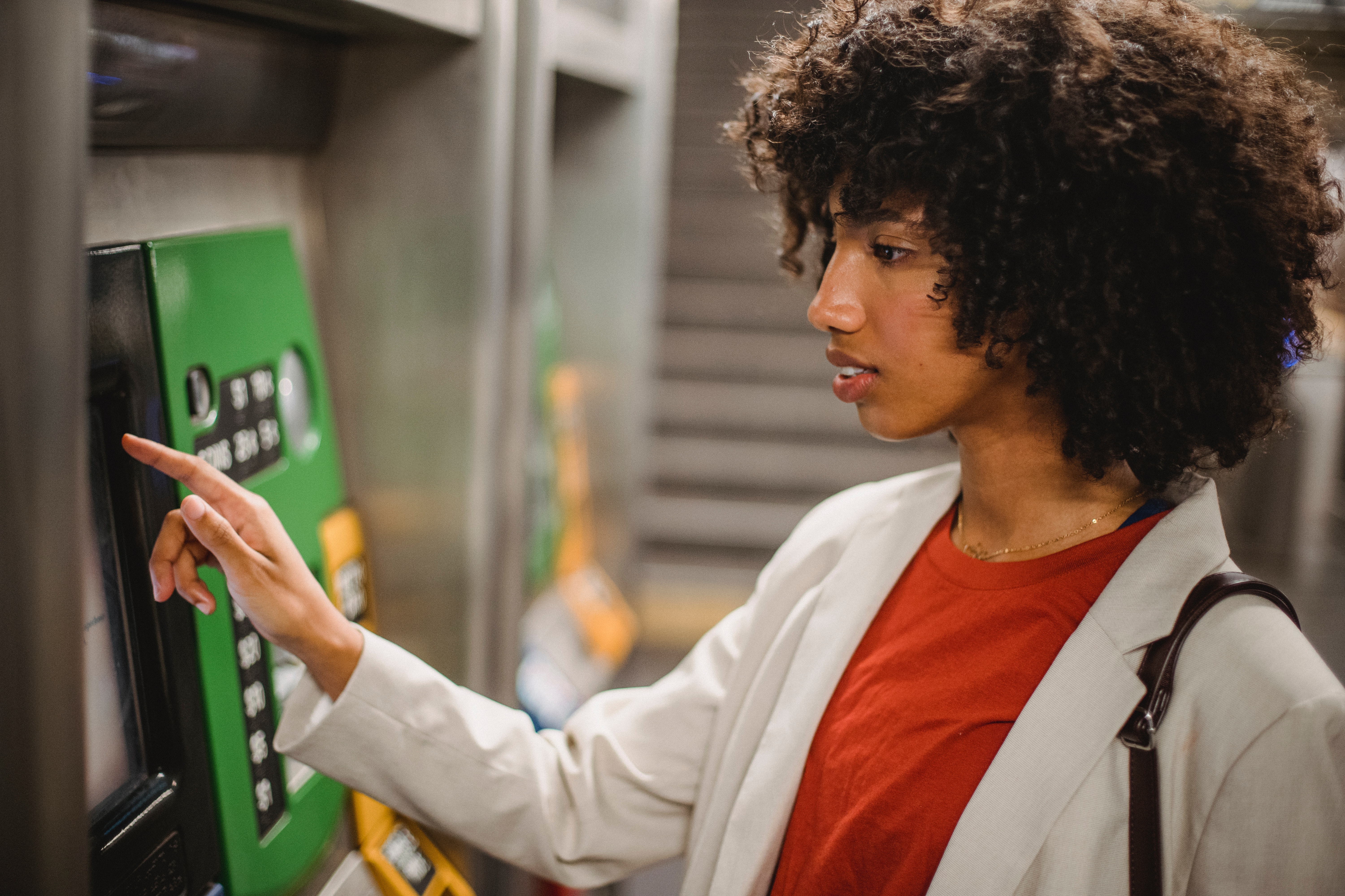 Photo by Roberto Hund: https://www.pexels.com/photo/photograph-of-a-woman-with-curly-hair-using-a-machine-5357178/