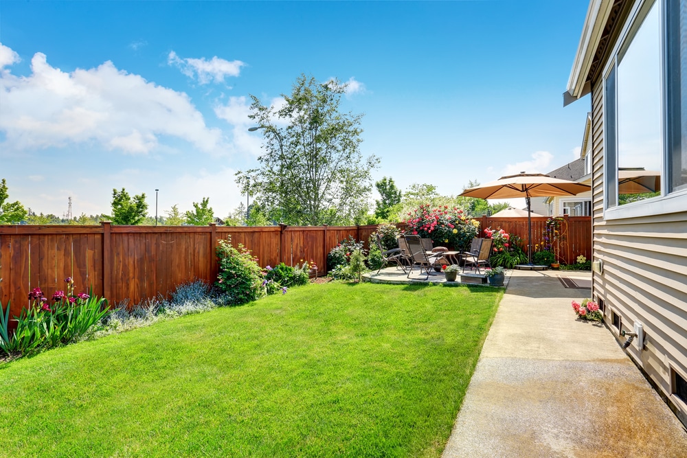 Beautiful-landscape-design-for-backyard-garden-and-patio-area-on-concrete-floor