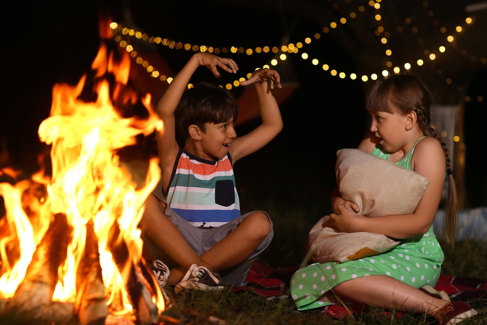 kids-telling-scary-stories-by-campfire