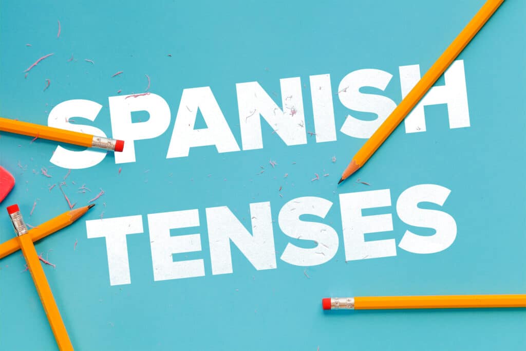 the word "spanish tenses" against a blue background surrounded by pencils