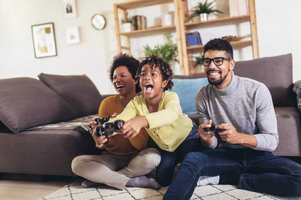 Family playing a video game together