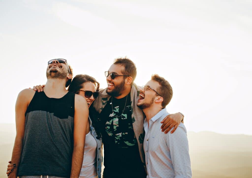 group-of-four-friends-laughing