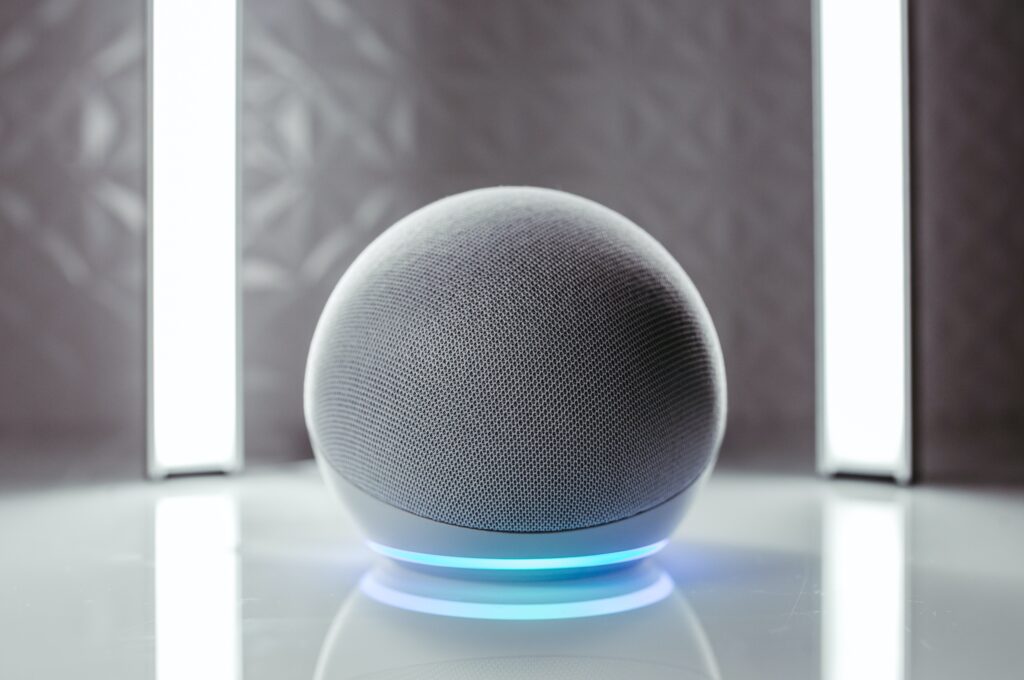 gray-speaker-glowing-blue-against-gray-background